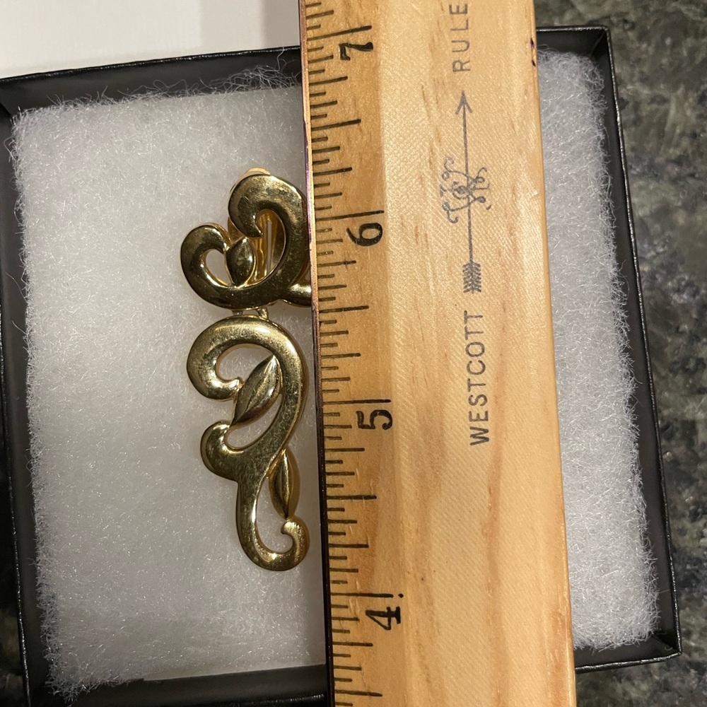 Gold Swirl vintage clip on earrings